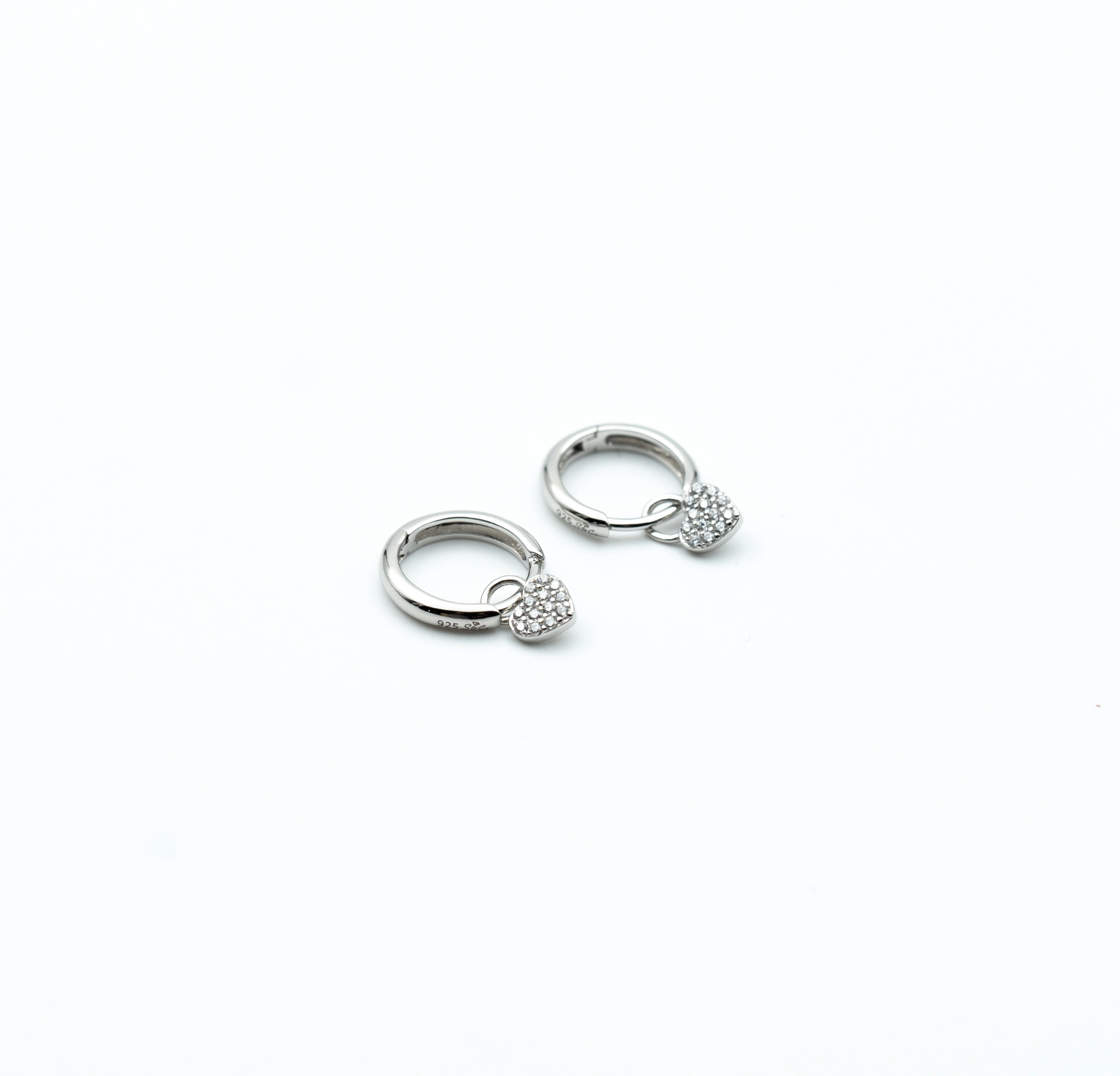 Charming: Sterling Silver Huggie Hoop Earrings with Pave Heart Charms - Portier Jewelry Charming: Sterling Silver Huggie Hoop Earrings with Pave Heart Charms - Image 2